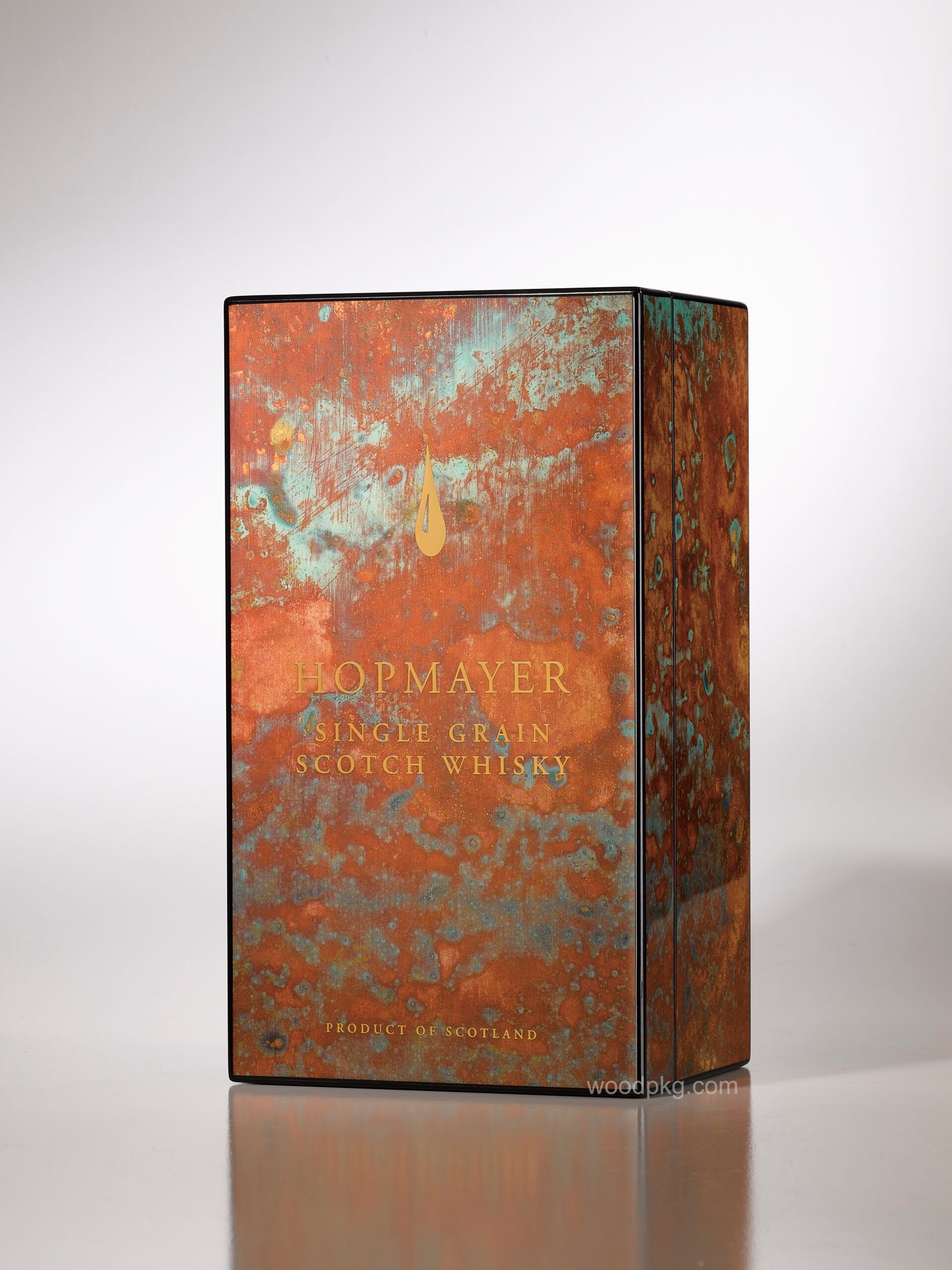 Custom MDF wooden box with a client-specified complex pattern, printed paper surface, metal appliqué, hand-painted black trim, and glossy lacquer finish