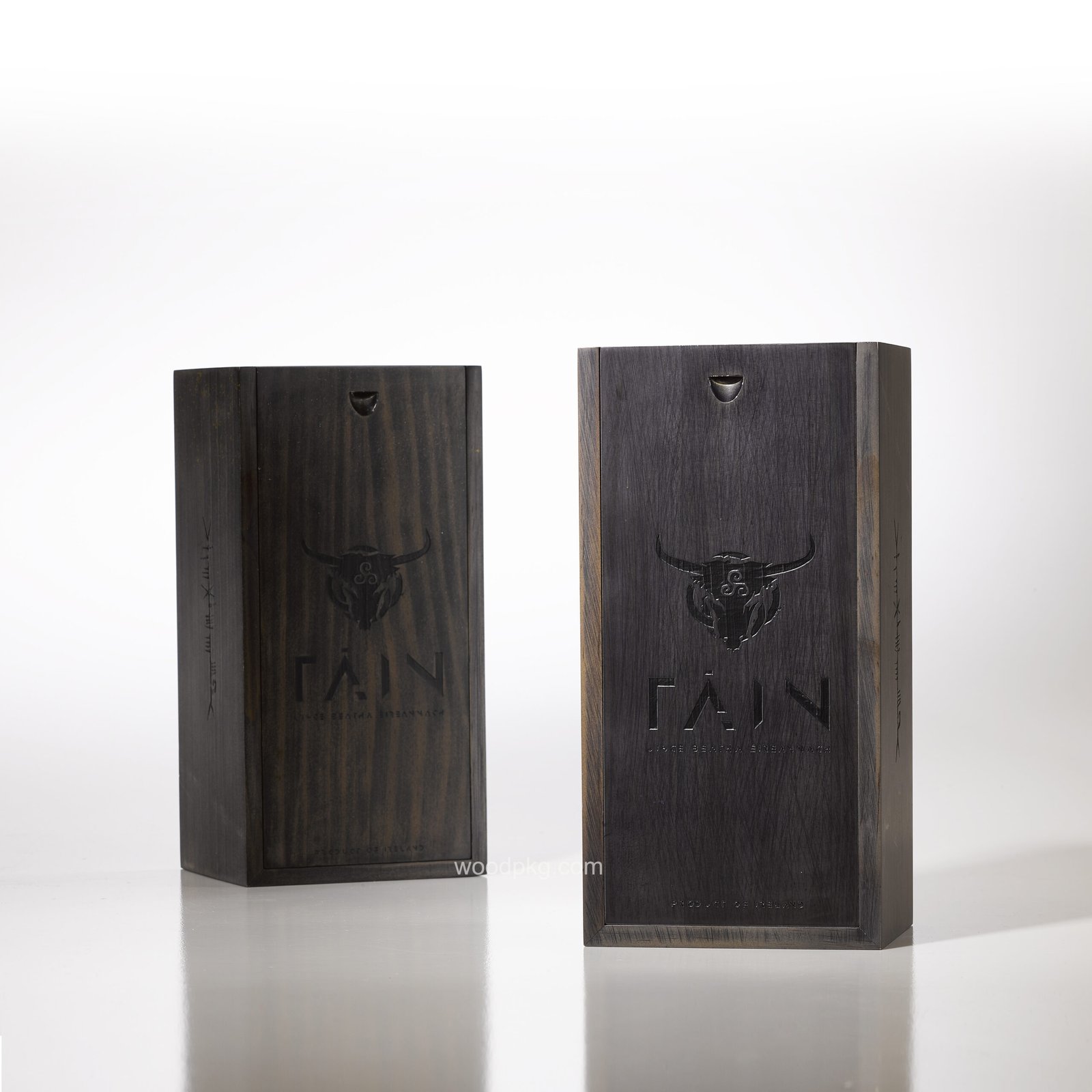 Custom solid pine wood whiskey box with a black matte finish and laser-engraved logo and pattern