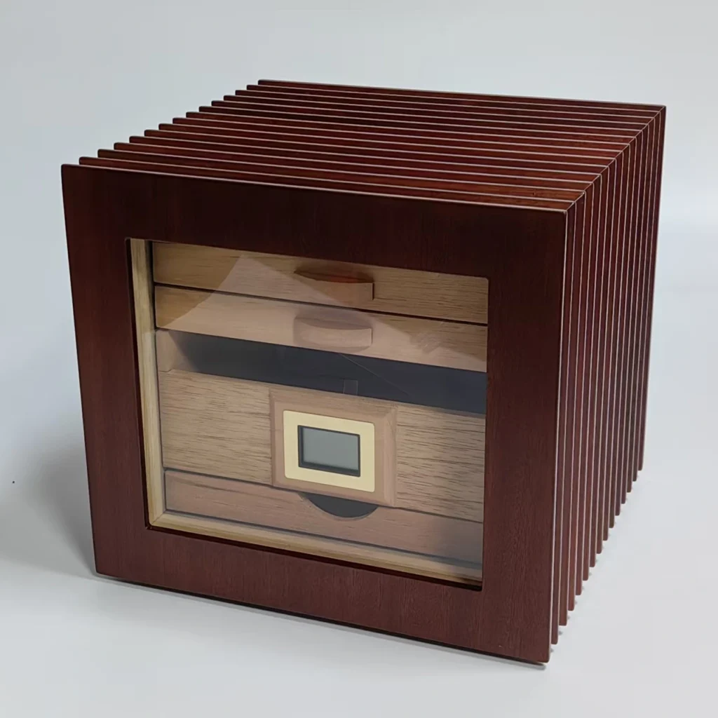 Cedar cigar humidor with a glass door, wooden drawers, digital hygrometer and ribbed exterior.