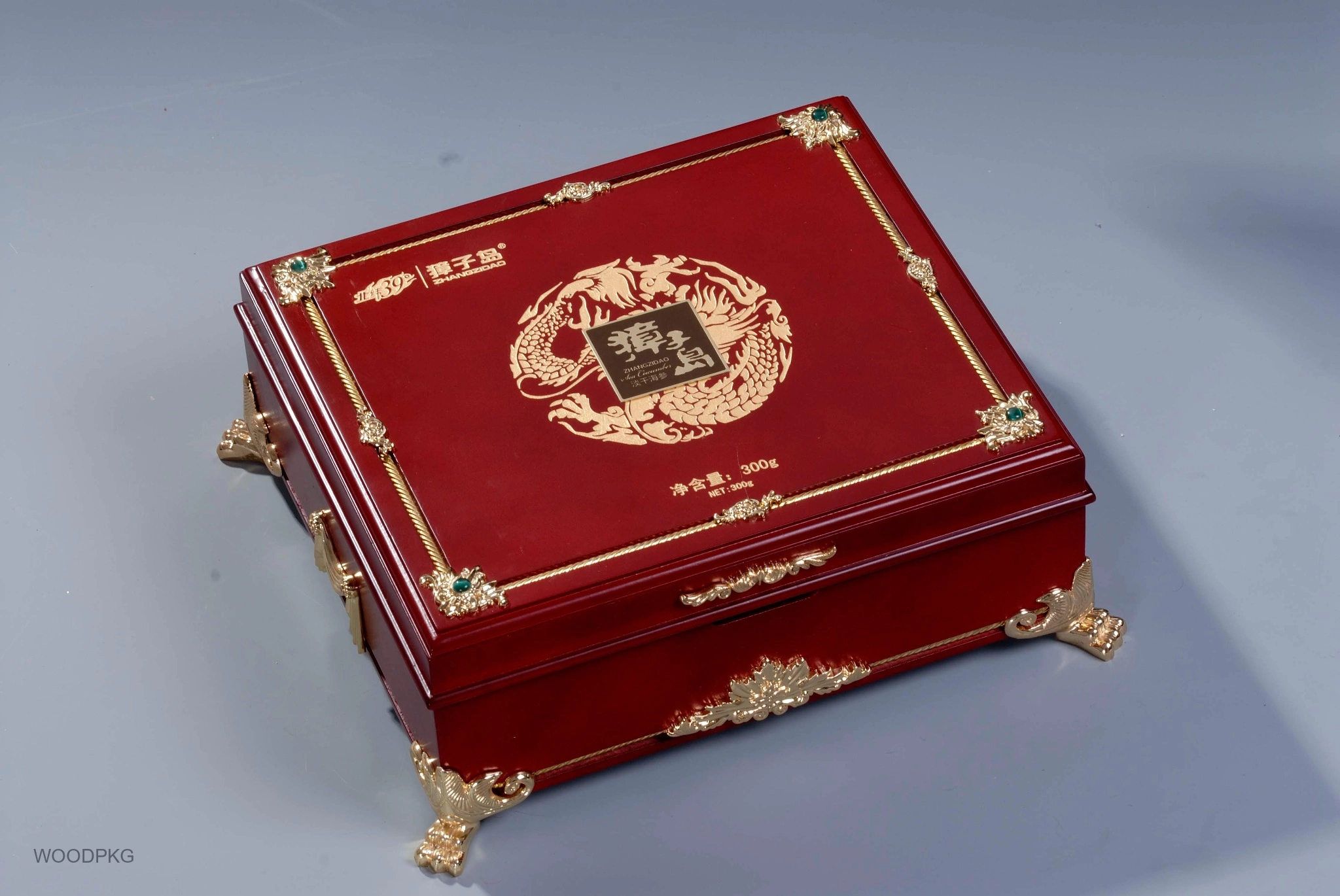 Custom red wooden sea cucumber gift box with 30% gloss lacquer finish, gold-tone metal fittings and decorative gemstone accents